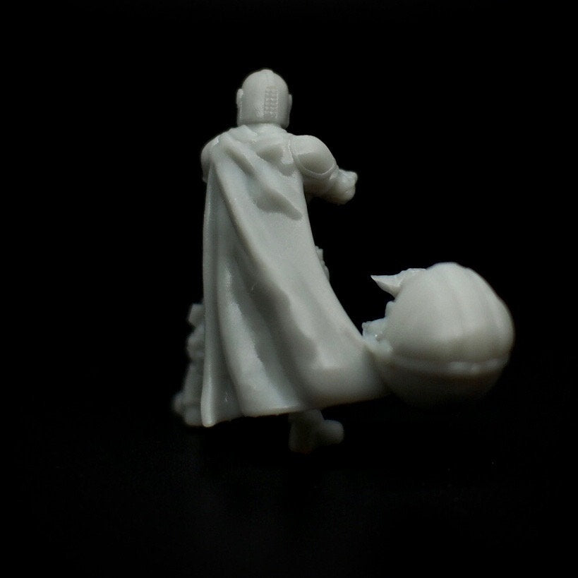 Der Mandalorianer mit schwebendem Baby Yoda